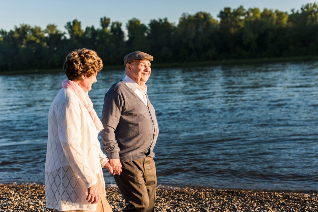 Elderly Couple Walking by the River